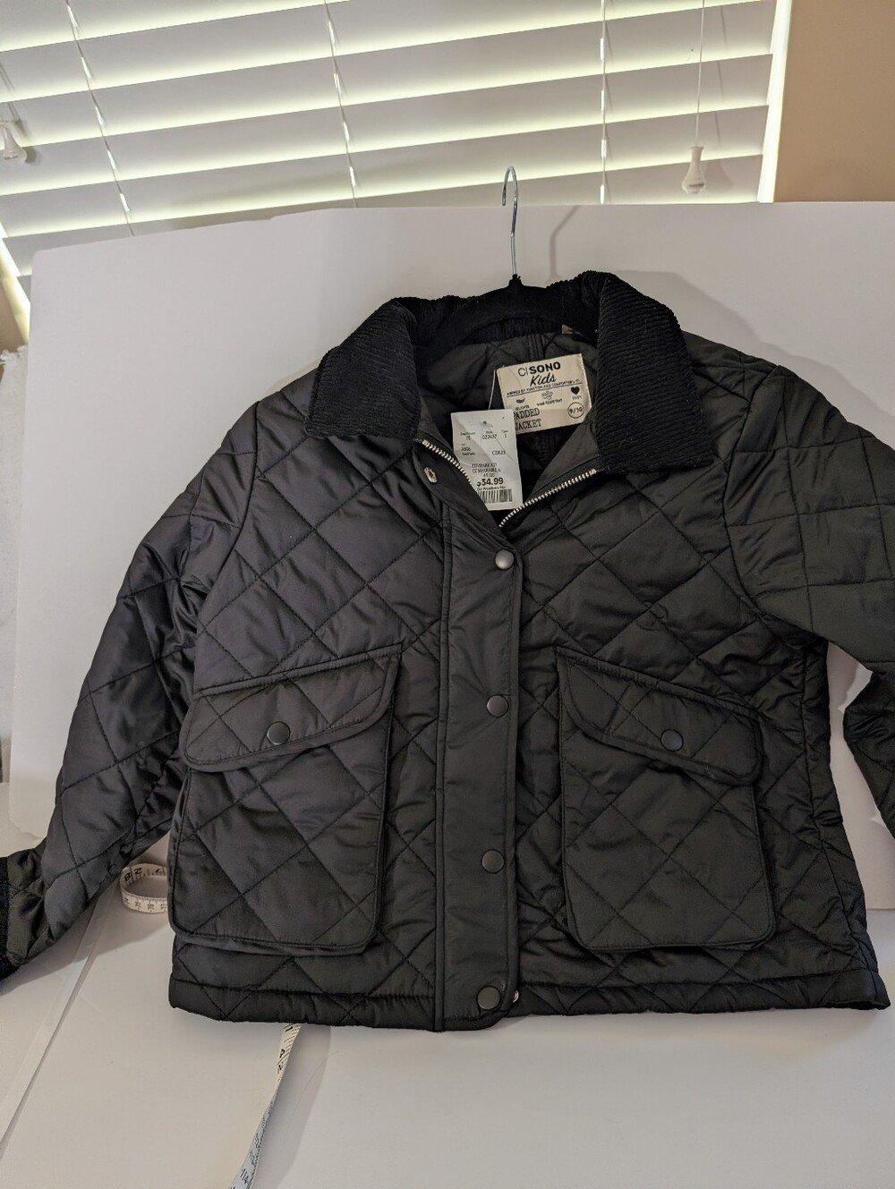 Girls Quilted Black Jacket with Corduroy Collar and cuffs